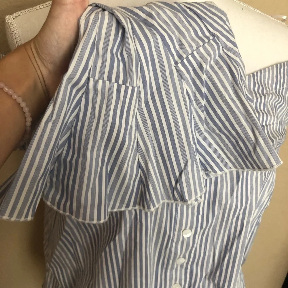 Free people march to the beat off shoulder top
